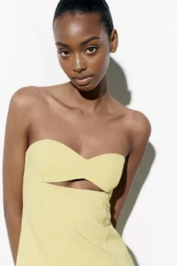 A-line dress with an elegant cutout design, perfect for formal occasions. 4
