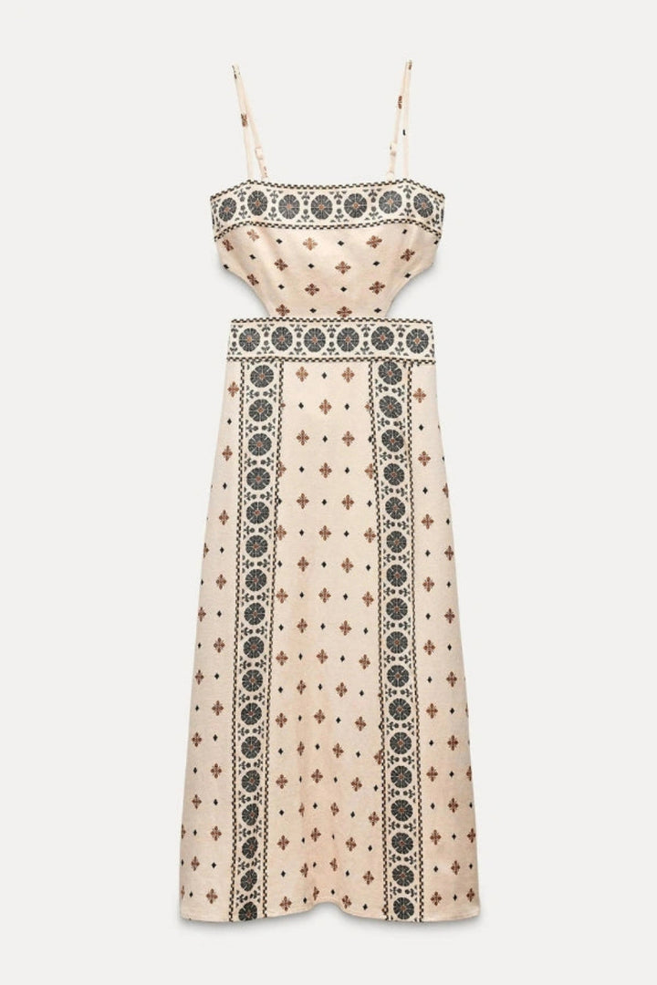 A-line dress featuring elegant embroidery and side cutouts, perfect for formal occasions. 4