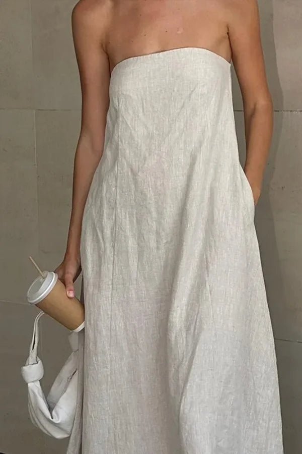 A-line dress featuring a sleek silhouette, perfect for formal occasions. 2