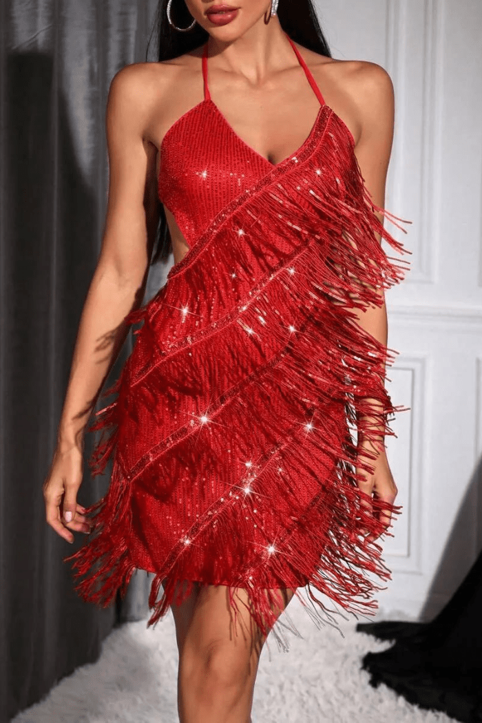 A-line halter neck dress with playful tassel details, perfect for casual outings. 4