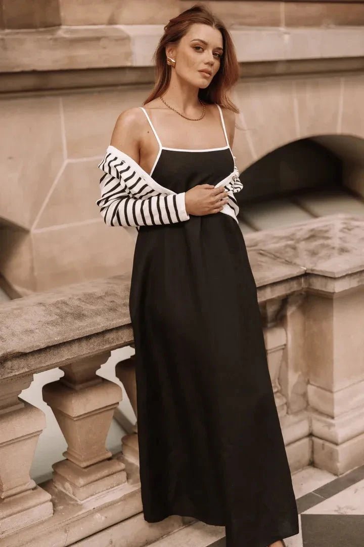 A-line midi dress with playful suspender straps, suitable for casual outings. 1