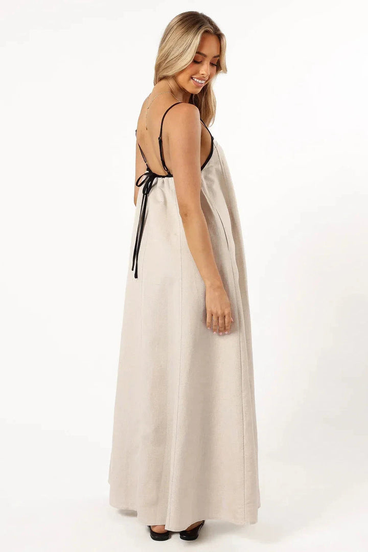A-line midi dress with playful suspender straps, suitable for casual outings. 3
