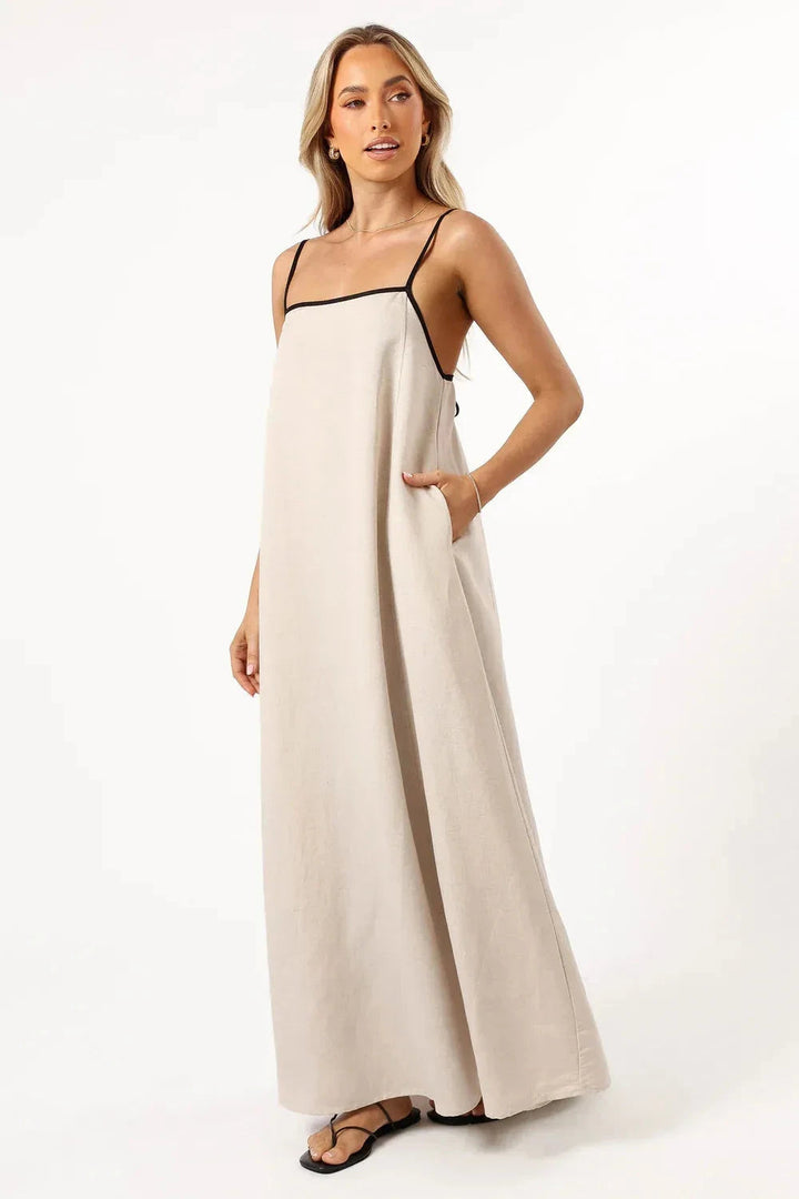 A-line midi dress with playful suspender straps, suitable for casual outings. 5