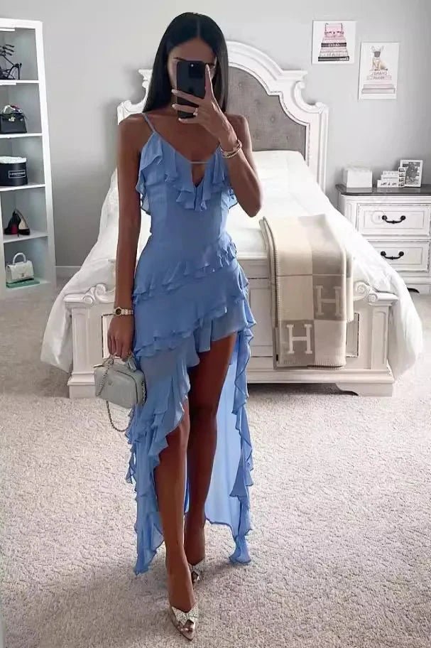 Asymmetrical spaghetti strap dress with ruffled design, perfect for a summer outing. 0