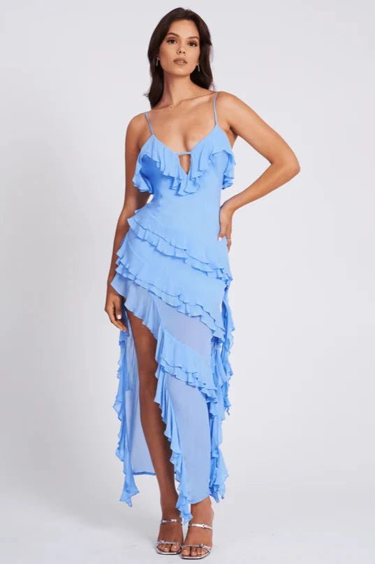 Asymmetrical spaghetti strap dress with ruffled design, perfect for a summer outing. 2