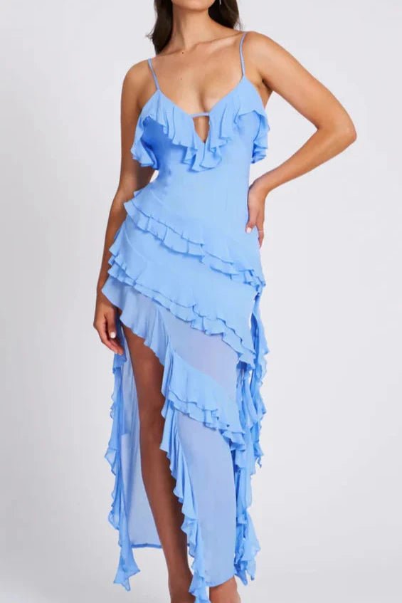 Asymmetrical spaghetti strap dress with ruffled design, perfect for a summer outing. 3
