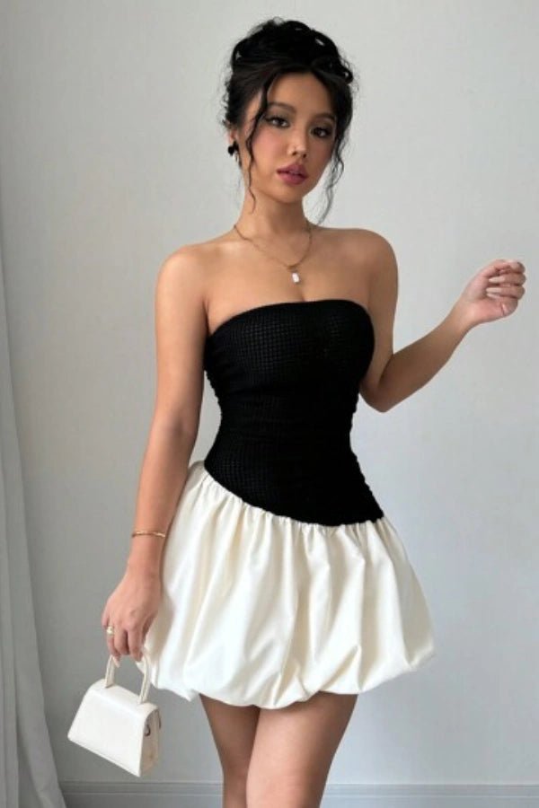 Strapless bubble skirt dress with a chic silhouette, perfect for formal occasions. 2