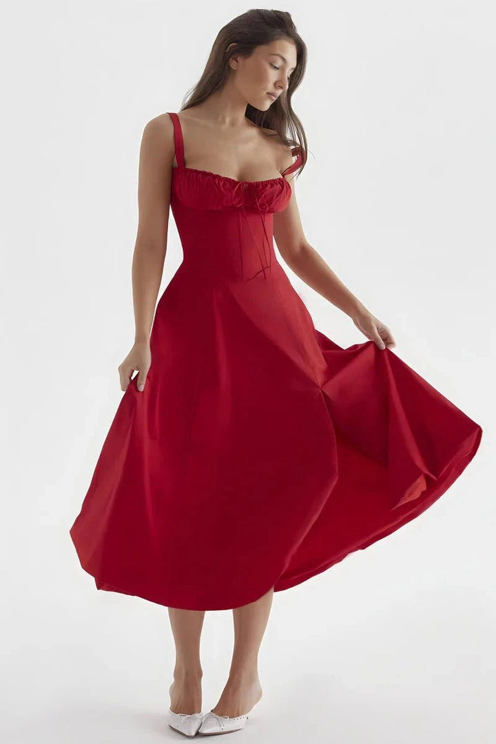 Bustier dress featuring a flared skirt and a side slit, perfect for formal occasions. 4