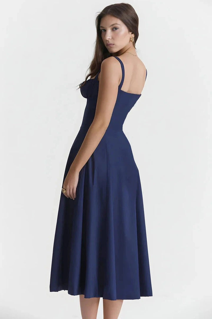 Bustier dress featuring a flared skirt and a side slit, perfect for formal occasions. 8