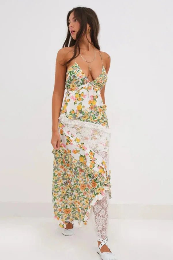 Chic dress featuring a plunging neckline and ruffle details, elegant silhouette suitable for formal occasions. 0