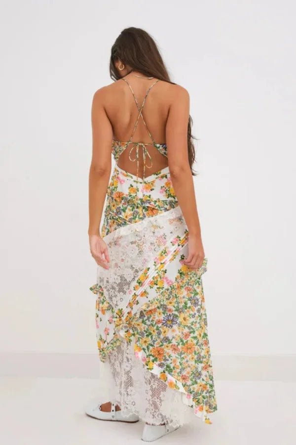 Chic dress featuring a plunging neckline and ruffle details, elegant silhouette suitable for formal occasions. 2