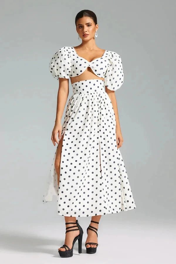 Chic two-piece outfit featuring a strapless top and fitted silhouette, perfect for formal events. 0