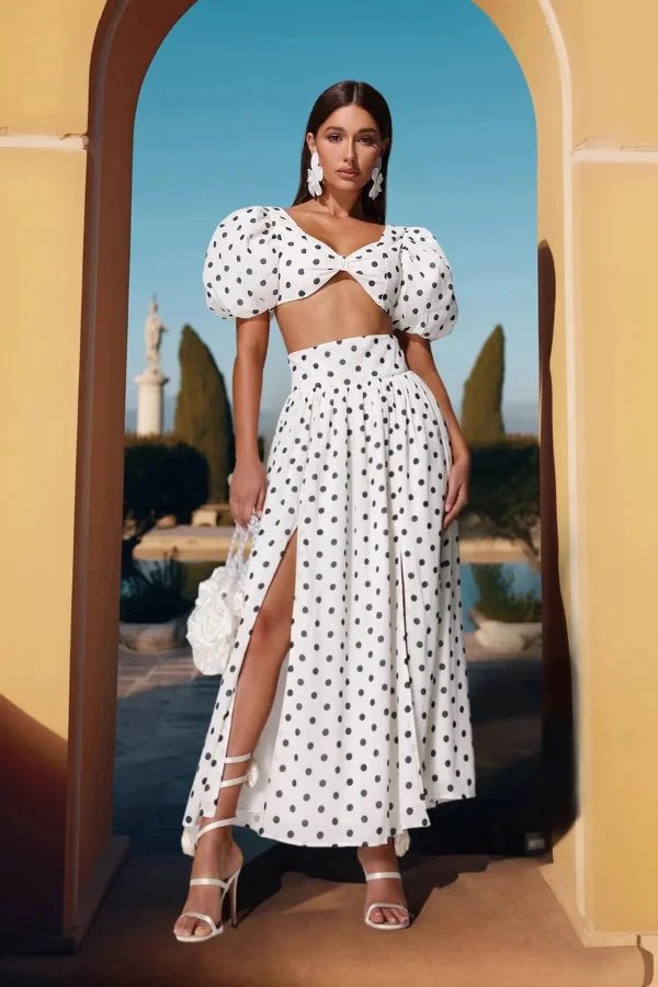 Chic two-piece outfit featuring a strapless top and fitted silhouette, perfect for formal events. 3