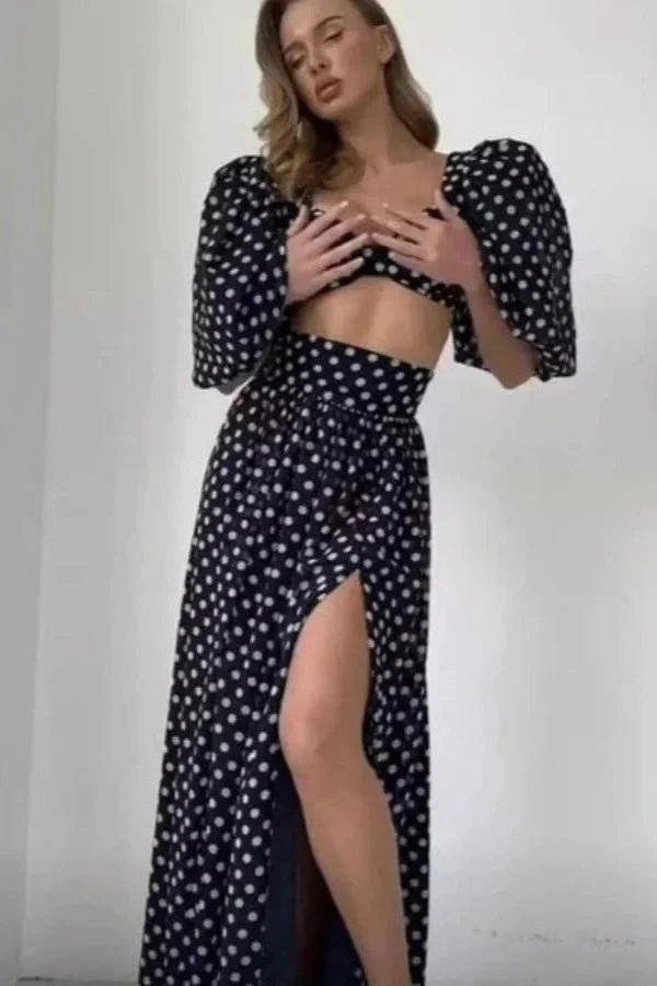 Chic two-piece outfit featuring a strapless top and fitted silhouette, perfect for formal events. 5