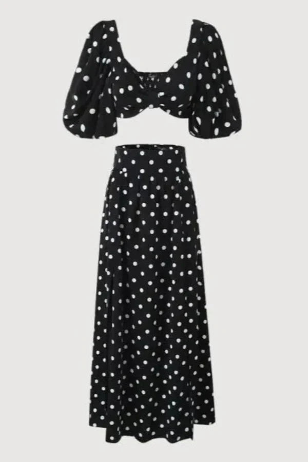 Chic two-piece outfit featuring a strapless top and fitted silhouette, perfect for formal events. 6