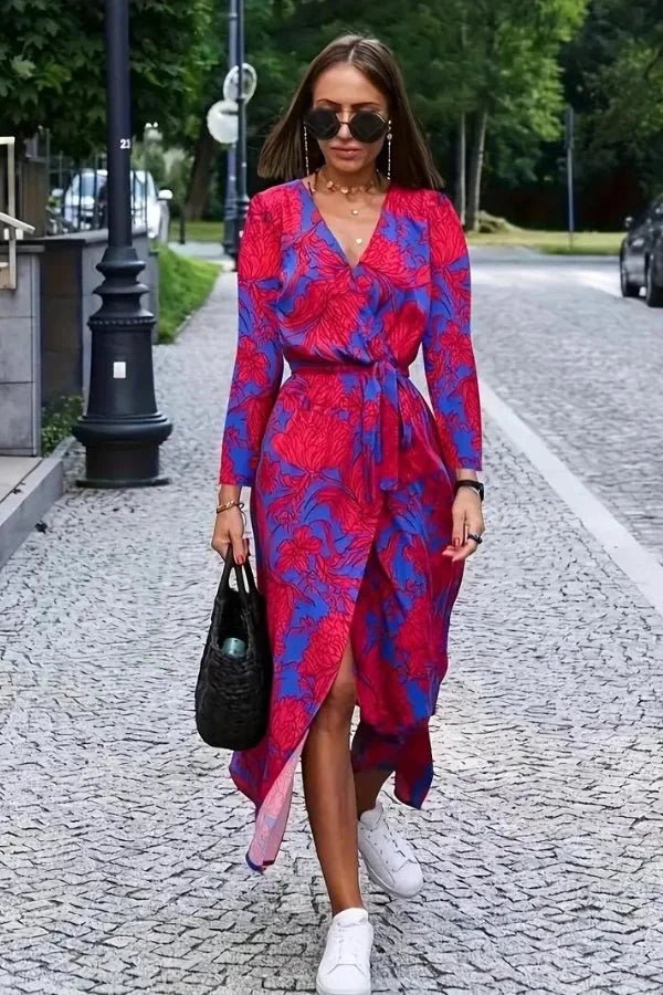A classic dress featuring a flattering silhouette, perfect for formal occasions. 0