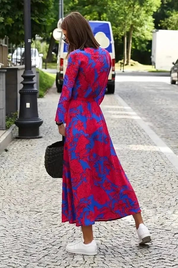 A classic dress featuring a flattering silhouette, perfect for formal occasions. 2