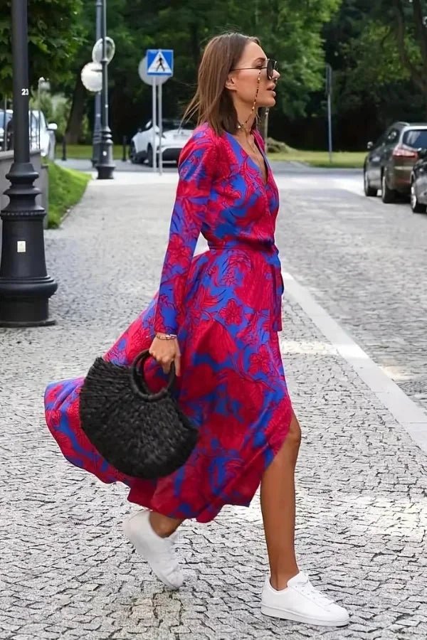A classic dress featuring a flattering silhouette, perfect for formal occasions. 3