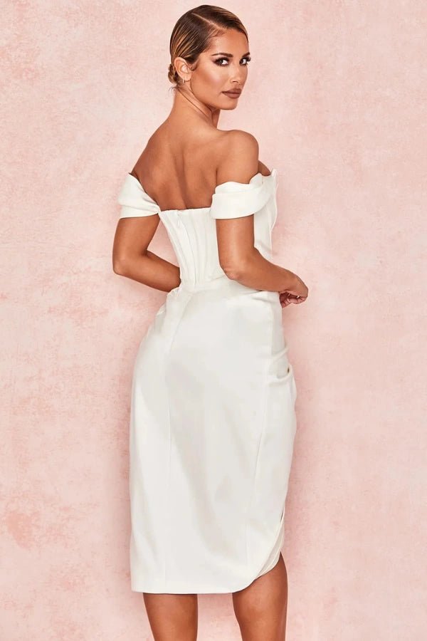 Corset dress with an asymmetrical draped skirt, elegant silhouette for formal occasions. 1