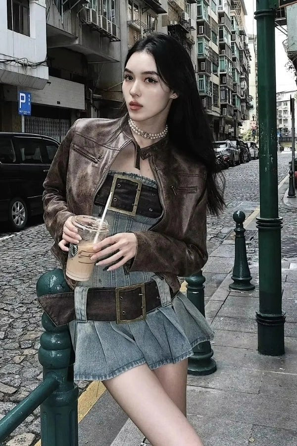 Corset top with a deconstructed denim design, featuring a fitted silhouette, suitable for casual outings. 1