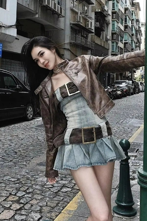 Corset top with a deconstructed denim design, featuring a fitted silhouette, suitable for casual outings. 2