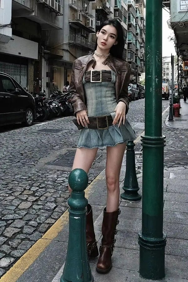 Corset top with a deconstructed denim design, featuring a fitted silhouette, suitable for casual outings. 3