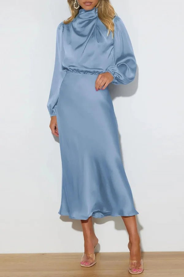 Ankle length dress with a half turtleneck design, featuring a sleek silhouette suitable for formal occasions. 10