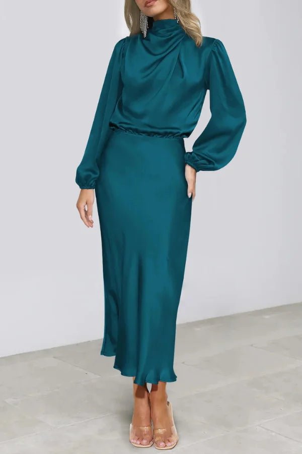 Ankle length dress with a half turtleneck design, featuring a sleek silhouette suitable for formal occasions. 11