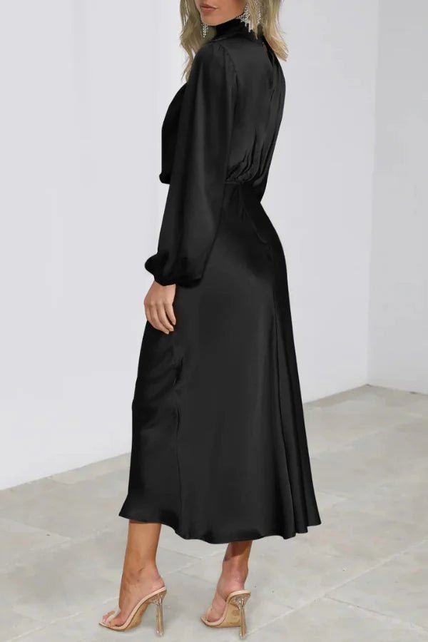Ankle length dress with a half turtleneck design, featuring a sleek silhouette suitable for formal occasions. 2