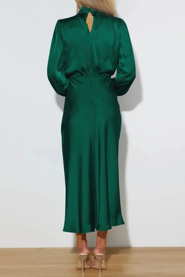 Ankle length dress with a half turtleneck design, featuring a sleek silhouette suitable for formal occasions. 7