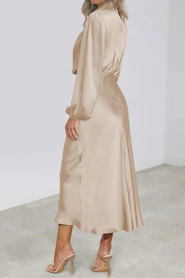 Ankle length dress with a half turtleneck design, featuring a sleek silhouette suitable for formal occasions. 8