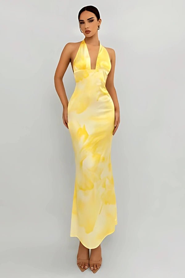 Elegant gown featuring a daring plunge neckline and a flowing silhouette, perfect for formal occasions. 1