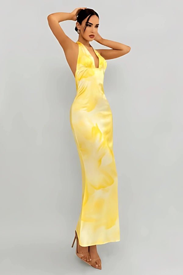 Elegant gown featuring a daring plunge neckline and a flowing silhouette, perfect for formal occasions. 4