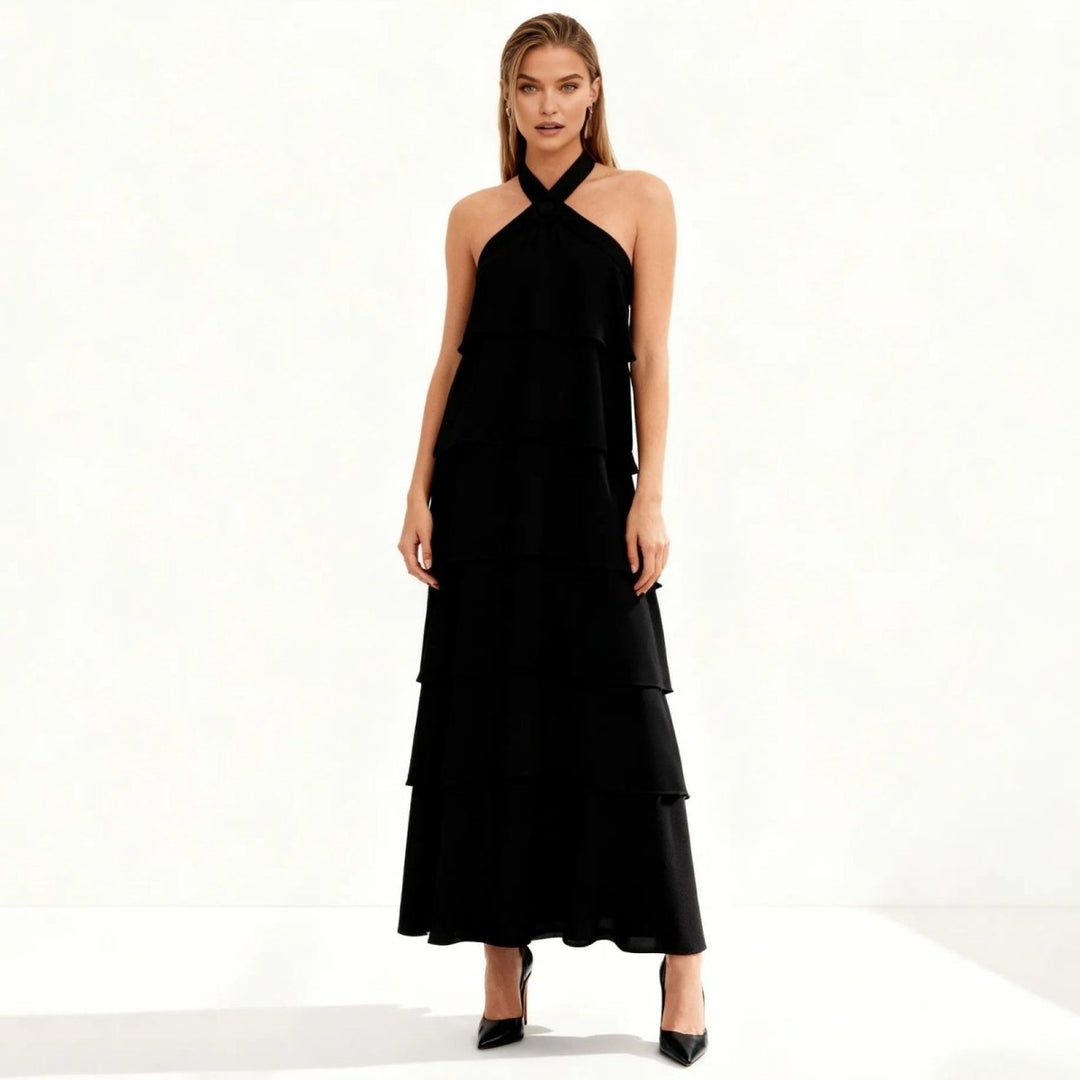Elegant gown featuring a halter neckline and tiered design, perfect for formal occasions. 1