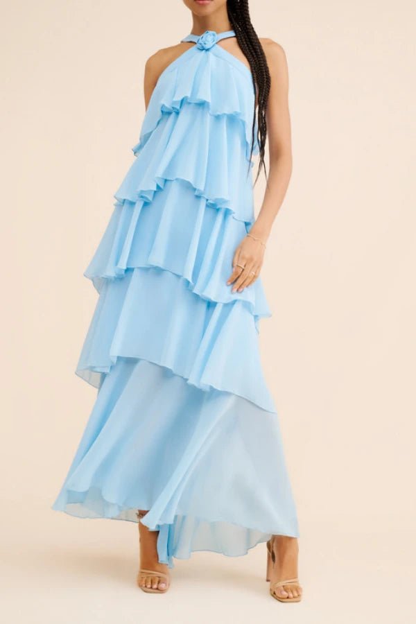 Elegant gown featuring a halter neckline and tiered design, perfect for formal occasions. 11