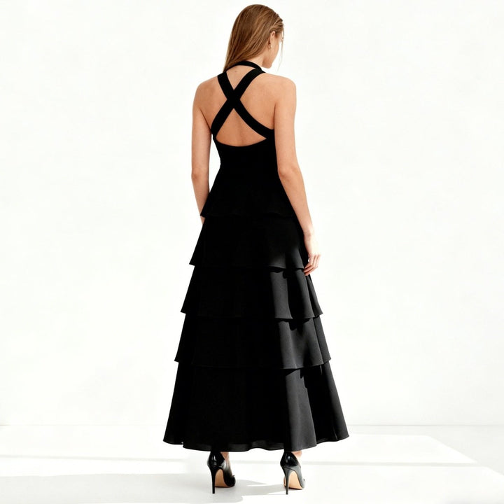 Elegant gown featuring a halter neckline and tiered design, perfect for formal occasions. 3