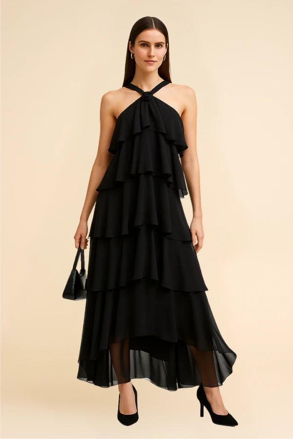 Elegant gown featuring a halter neckline and tiered design, perfect for formal occasions. 4