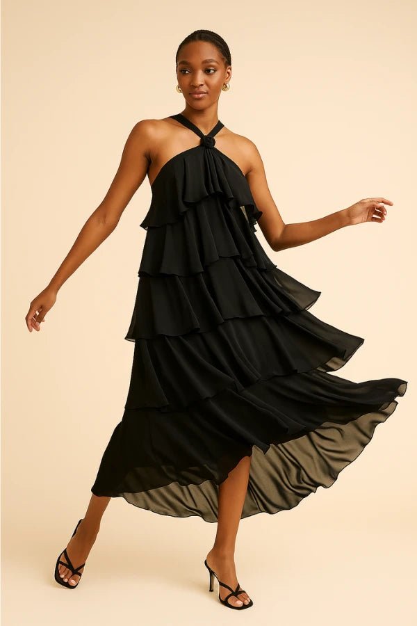 Elegant gown featuring a halter neckline and tiered design, perfect for formal occasions. 5