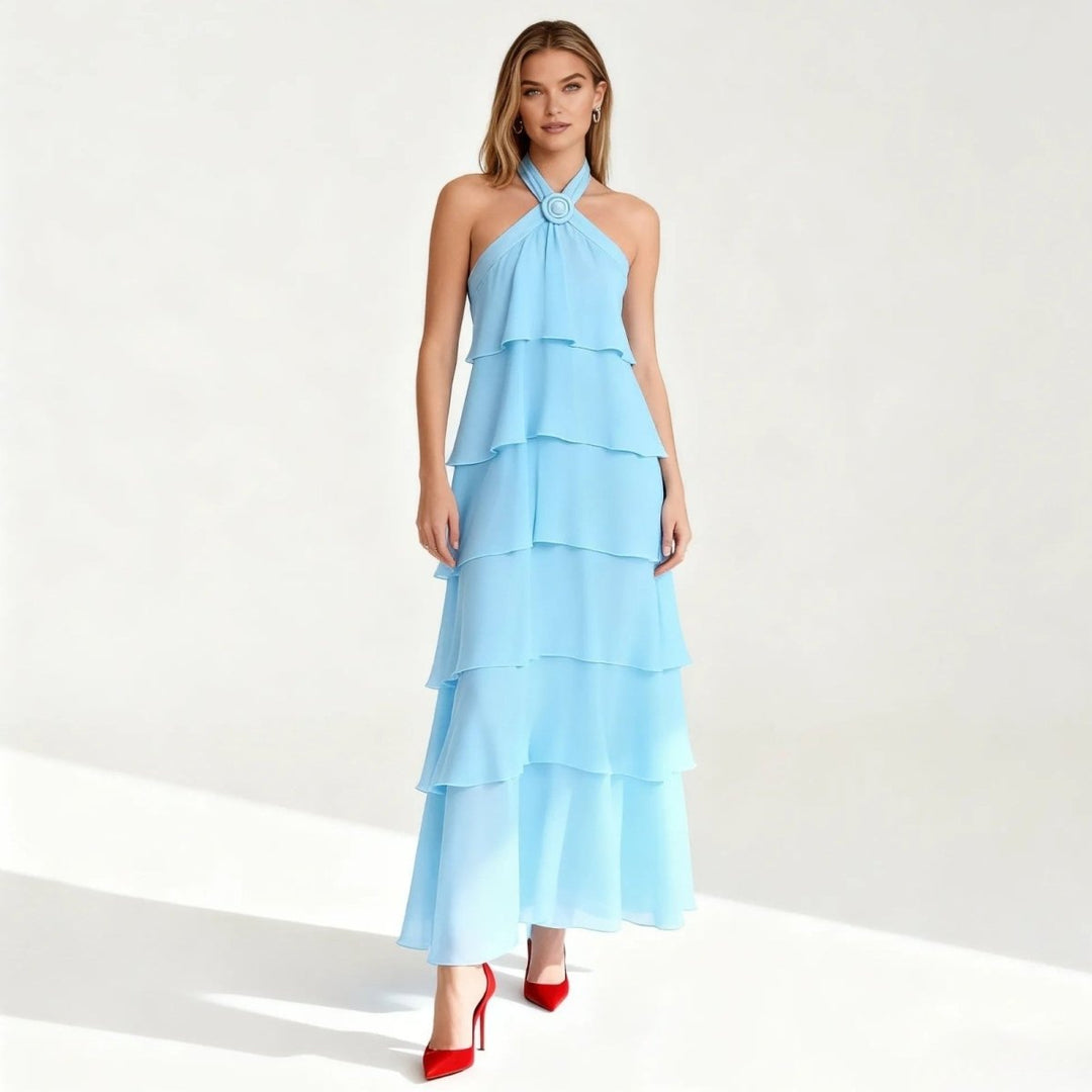 Elegant gown featuring a halter neckline and tiered design, perfect for formal occasions. 8
