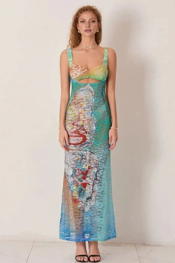 Elegant gown featuring an intricate floral design in a flowing silhouette, perfect for formal occasions. 1