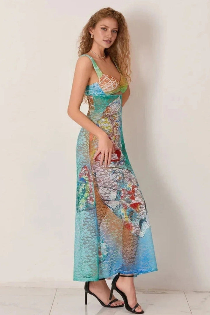 Elegant gown featuring an intricate floral design in a flowing silhouette, perfect for formal occasions. 3