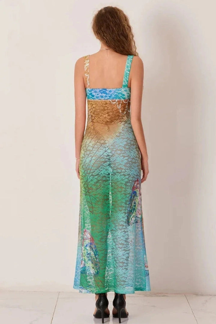 Elegant gown featuring an intricate floral design in a flowing silhouette, perfect for formal occasions. 4