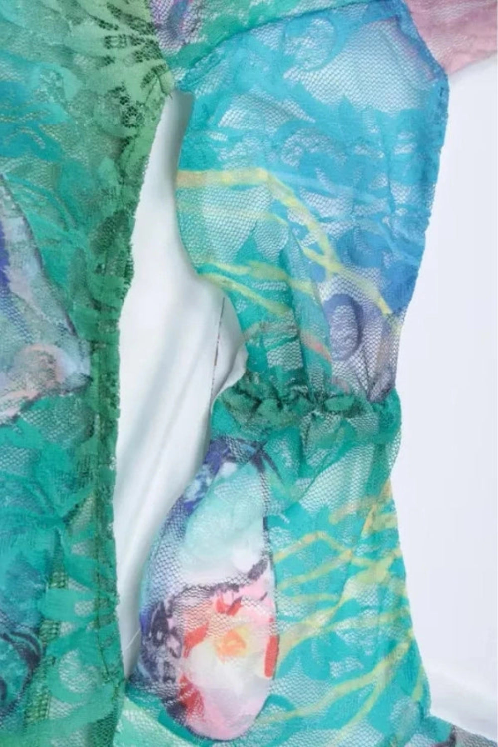 Elegant gown featuring an intricate floral design in a flowing silhouette, perfect for formal occasions. 6