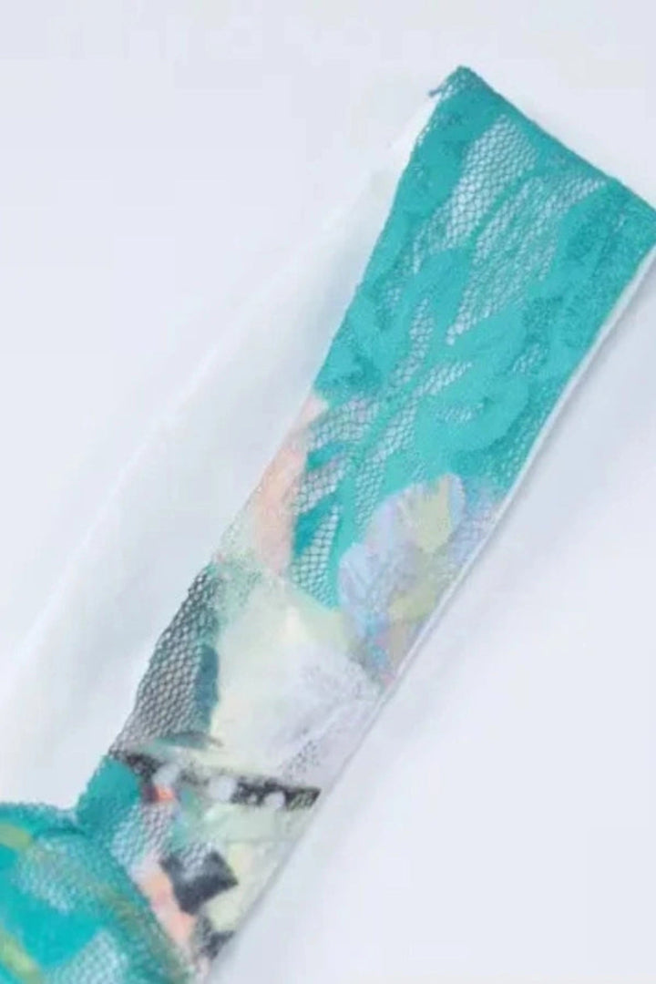 Elegant gown featuring an intricate floral design in a flowing silhouette, perfect for formal occasions. 8