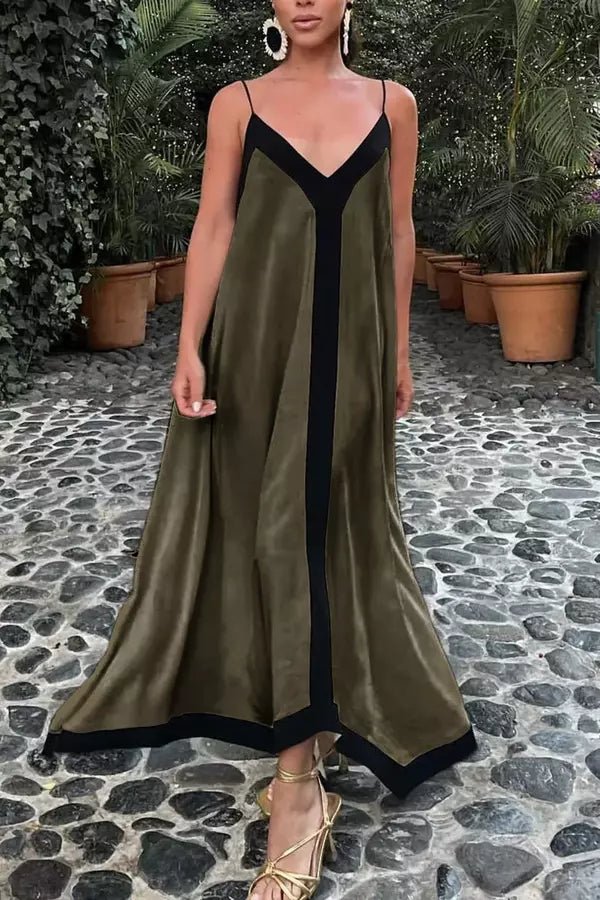 Elegant long dress featuring a sculpted silhouette, perfect for formal occasions. 0