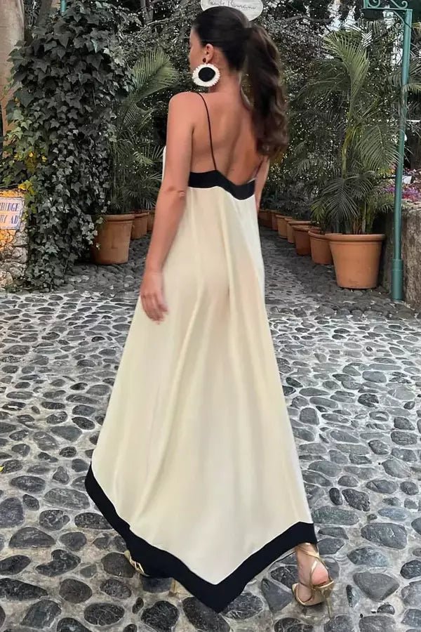 Elegant long dress featuring a sculpted silhouette, perfect for formal occasions. 2