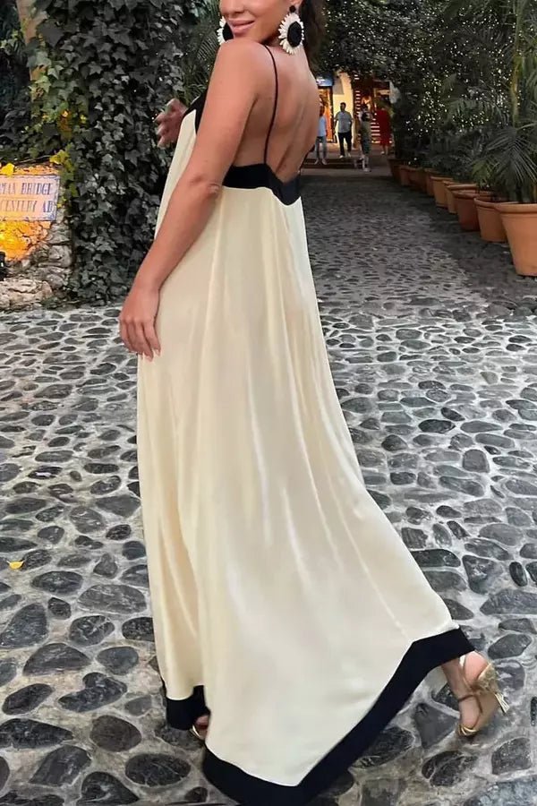 Elegant long dress featuring a sculpted silhouette, perfect for formal occasions. 3