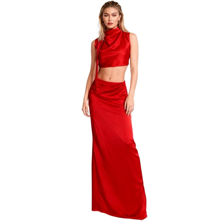 An elegant maxi dress featuring an open back design, perfect for formal events. 4