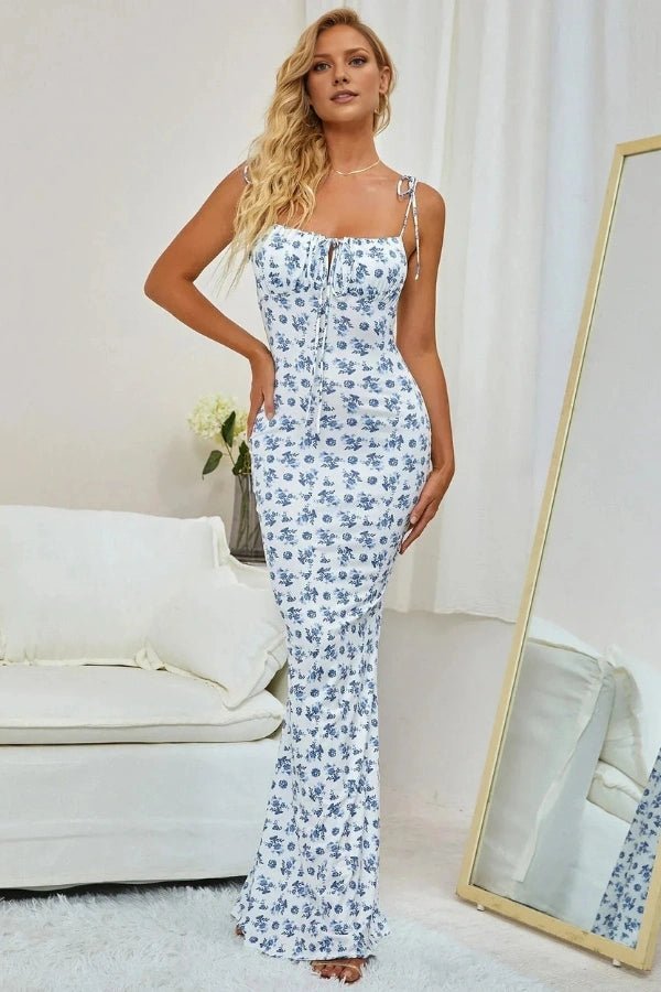 Elegant mermaid gown with a floral print design, featuring a fitted silhouette, perfect for formal occasions. 2