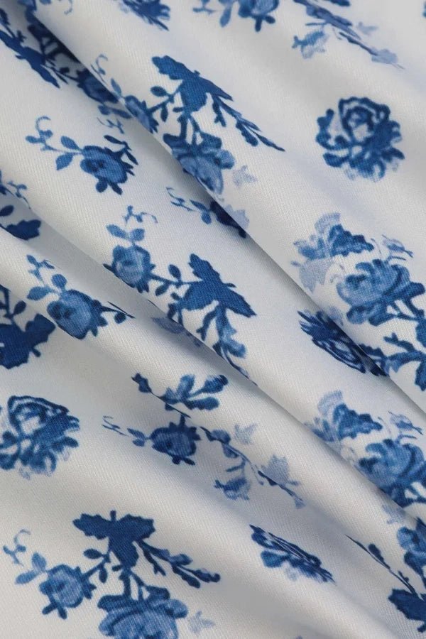 Elegant mermaid gown with a floral print design, featuring a fitted silhouette, perfect for formal occasions. 7